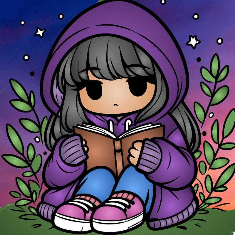 girl in oversized hoodie reading a book