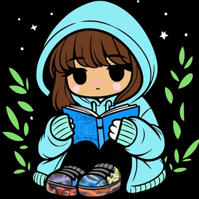 girl in oversized hoodie reading a book