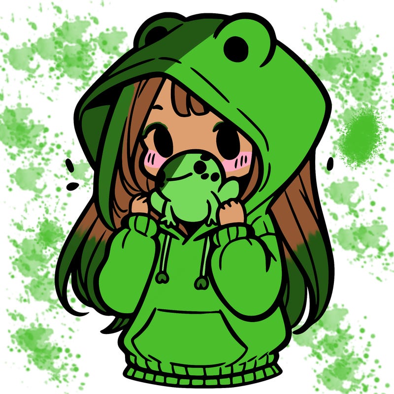 a girl holding a froggy hoodie