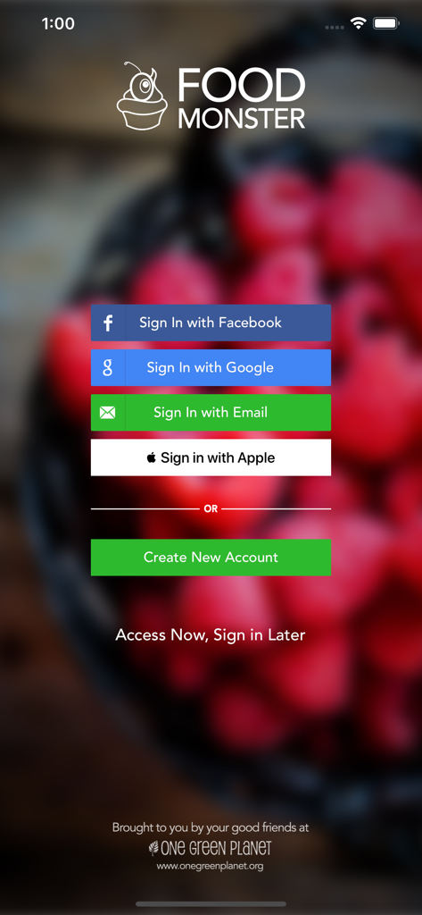Login screen for the Food Monster vegan recipe app featuring various social sign-in buttons over a blurred berry background
