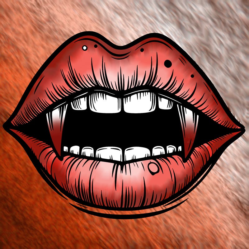 lips with vampire teeth
