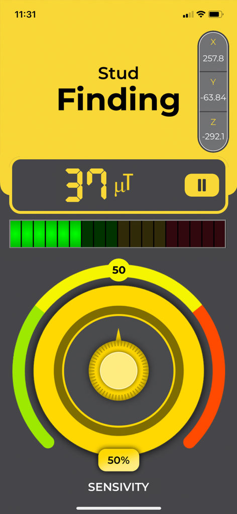 Stud Finder app interface showing magnetic field strength and sensitivity settings