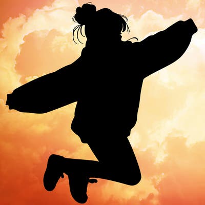 realistic girl jumping with a bun and oversized sweatshirt