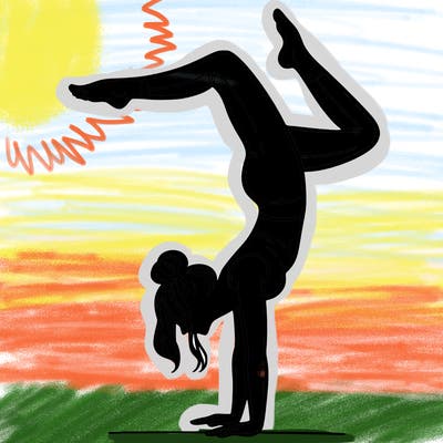 a woman doing a handstand