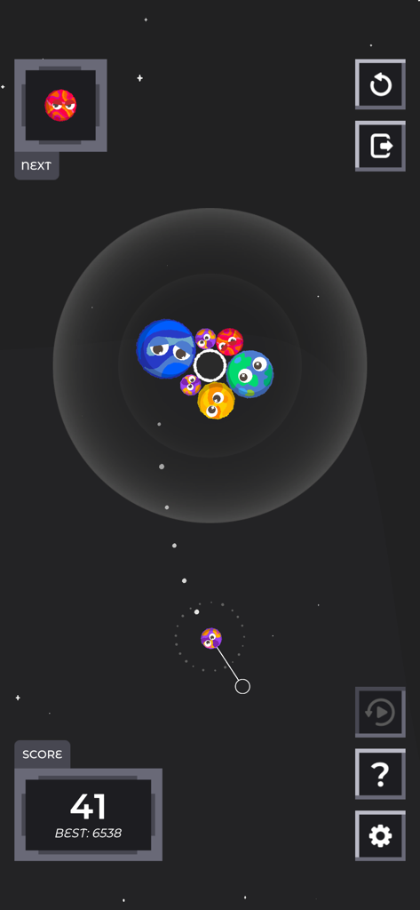 Gameplay screenshot of Sputnika Game showing cute planets with faces merging in a space-themed gravity puzzle