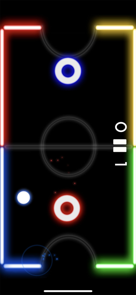 Vista dall'alto di un tavolo da air hockey neon con mazze rosse e blu e un disco bianco