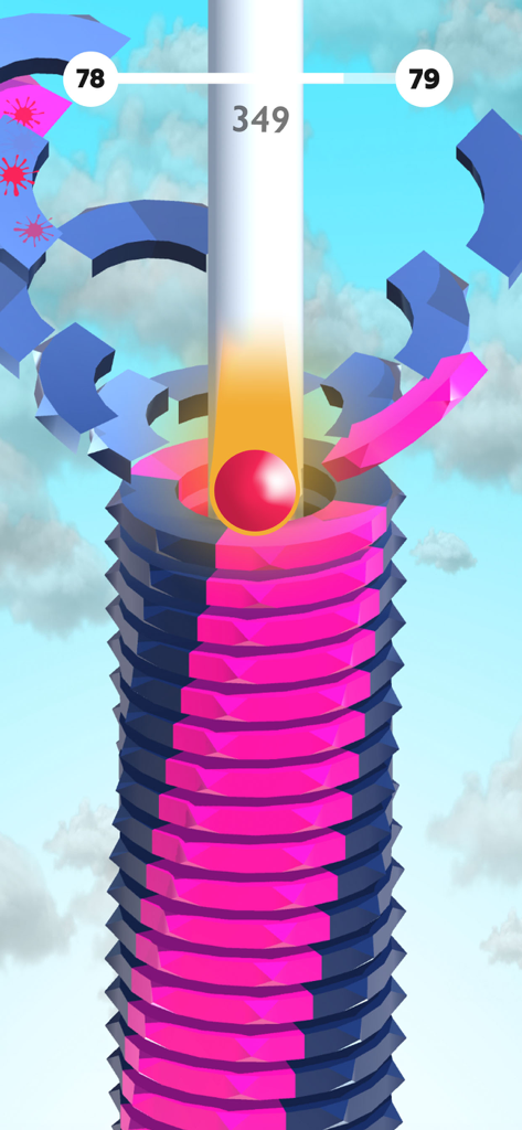 Bola roja saltando por una torre de hélice espiral con plataformas rosas y azules en Jump Start Bounzy Ballz.