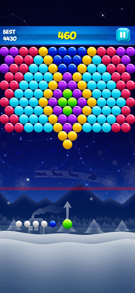 Bubble Shooter Classic Puzzles - Jugabilidad de Bubble Shooter Classic Puzzles con burbujas de colores y un fondo de noche de invierno.