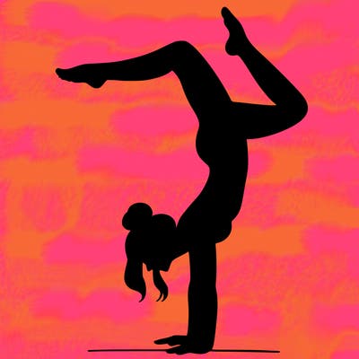 a woman doing a handstand