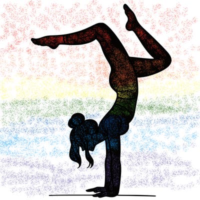 a woman doing a handstand