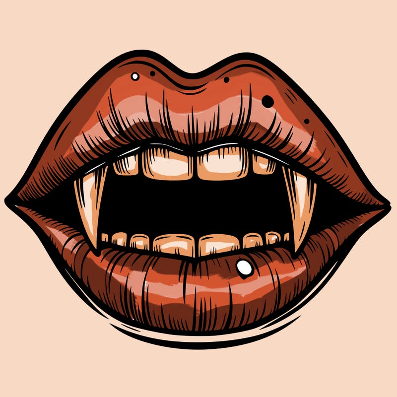 lips with vampire teeth