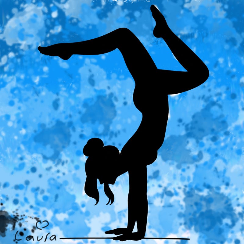 a woman doing a handstand