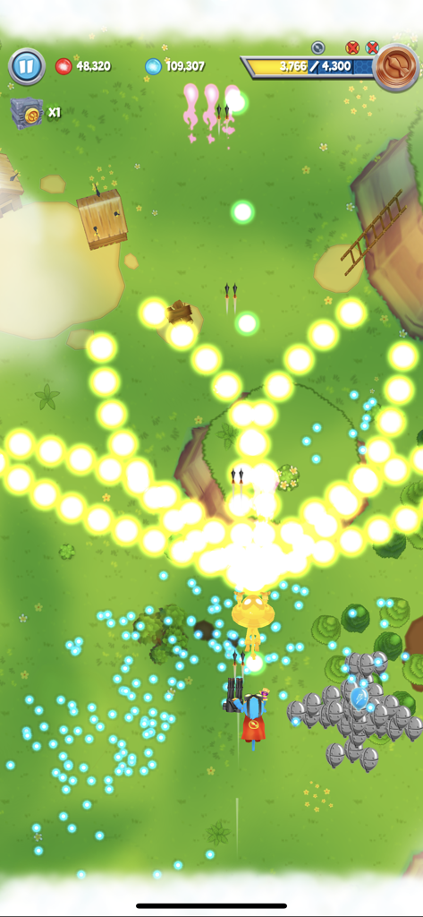 Bloons Supermonkey 2 - Bloons Supermonkey 2 gameplay showing a golden monkey shooting massive patterns of yellow energy at incoming bloons.