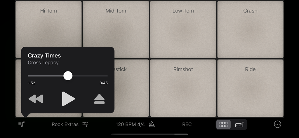 Rhythm Pad Pro drum pads interface with a music player overlay for playing along to tracks.
