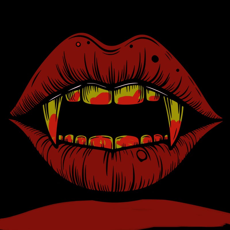lips with vampire teeth