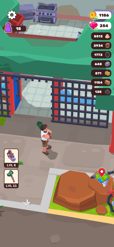 Um personagem está em uma base desértica no jogo móvel Wasteland Life Survival Idle com ícones de recursos e ferramentas exibidos.