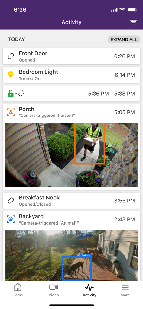 The Activity screen of the TELUS SmartHome app displaying a timeline of home events including door openings, light activity, and camera motion alerts for the porch and backyard.