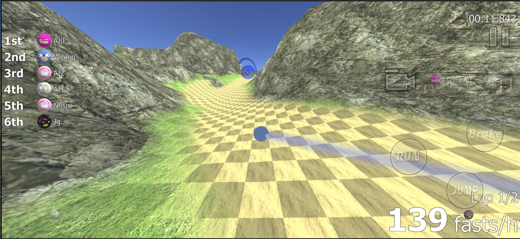 Sanic Ball - A blue ball character racing through a mountain canyon on a checkered track in Sanic Ball.