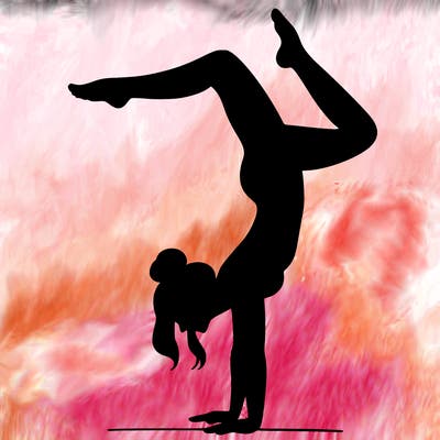 a woman doing a handstand