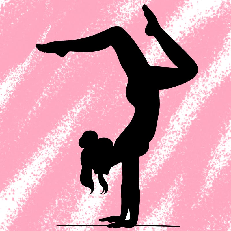 a woman doing a handstand