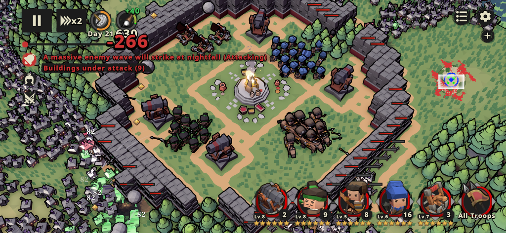 Inkvasion - Une capture d'écran du gameplay vue de dessus d'Inkvasion montrant une base fortifiée en blocs avec des canons et des troupes défendant contre des vagues massives d'ennemis d'encre