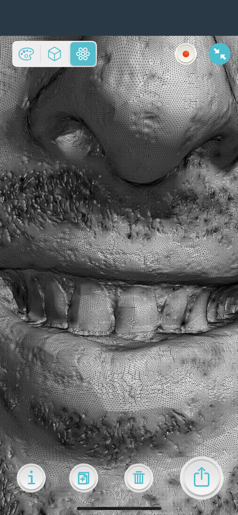 High-resolution 3D wireframe mesh of a human face and teeth in the Qlone Dental Pro app interface