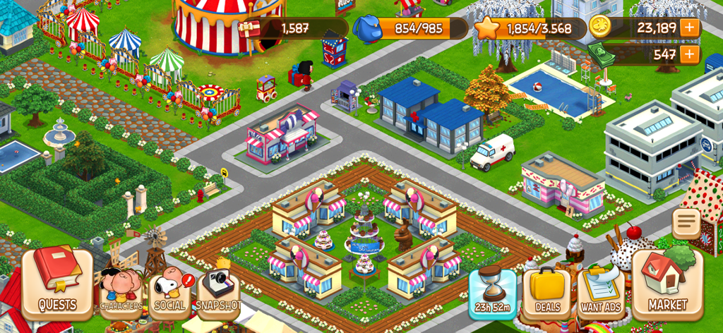 A top down view of a customized digital neighborhood in Snoopy Town Tale featuring shops and decorations