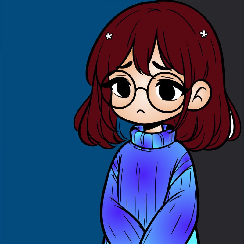 sad girl with glasses in a sweater
