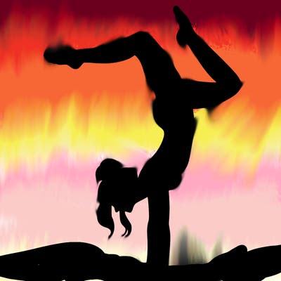 a woman doing a handstand