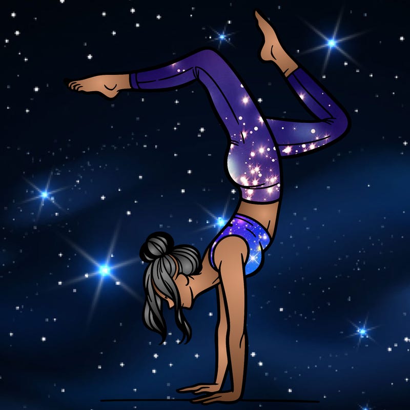 a woman doing a handstand