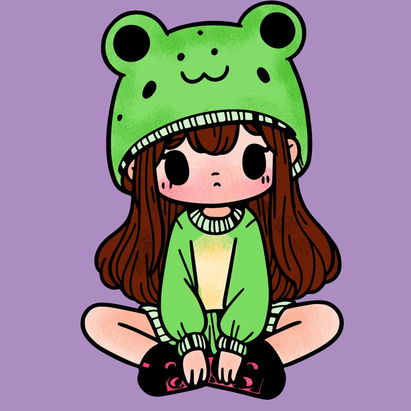 a girl wearing a frog hat and some frog socks