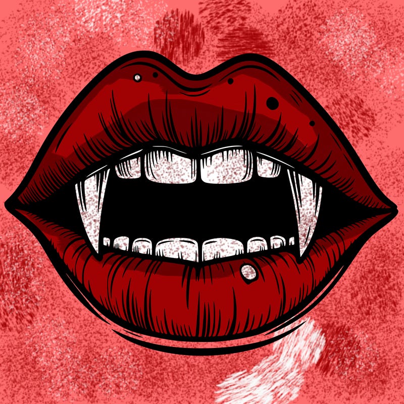 lips with vampire teeth