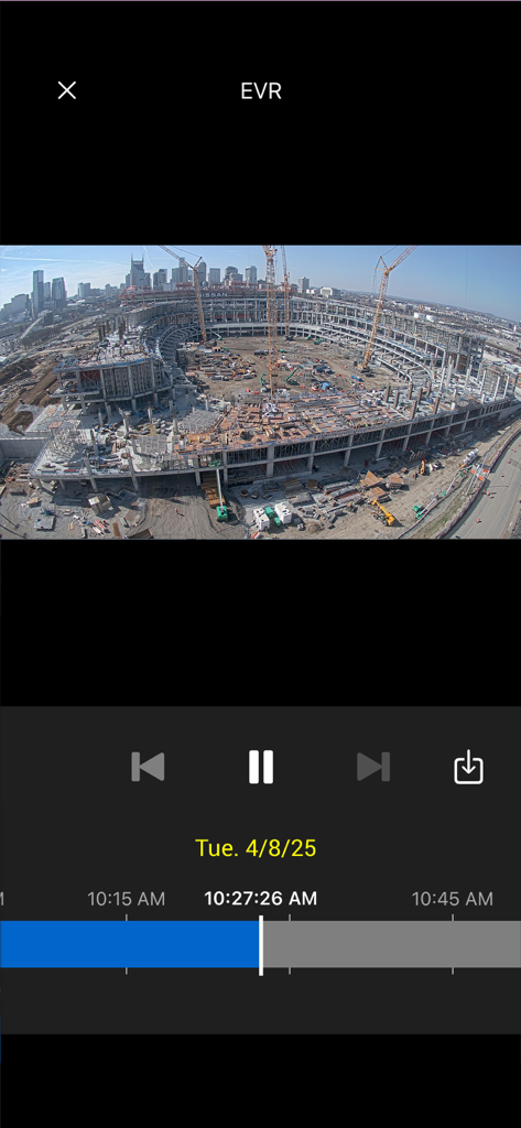 EarthCam - EarthCam app interface showing a video playback of a large stadium construction project with a timeline and playback controls