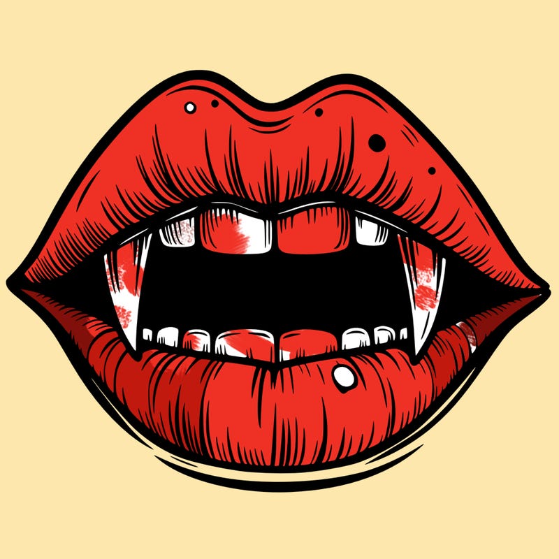 lips with vampire teeth