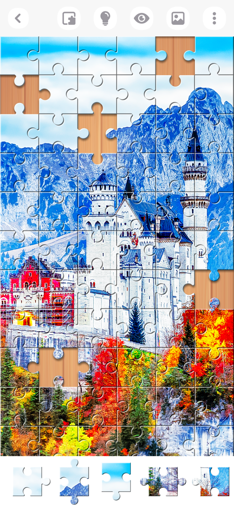 Jigsaw Puzzles Explorer - Gameplay von Jigsaw Puzzles Explorer, das ein teilweise fertiggestelltes Puzzle einer weißen Burg und Herbstberge zeigt.