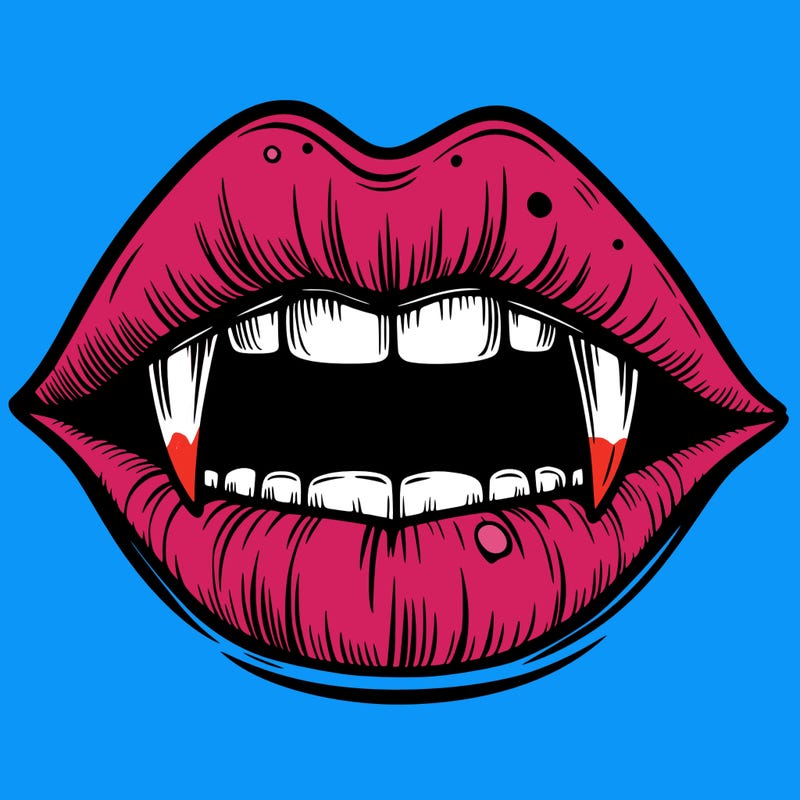 lips with vampire teeth