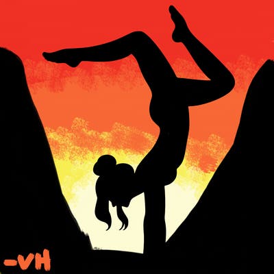 a woman doing a handstand