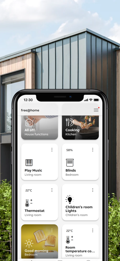 ABB-free@home® Next - Panel de control de la aplicación ABB-free-at-home Next mostrando controles de hogar inteligente para luces y climatización en un iPhone