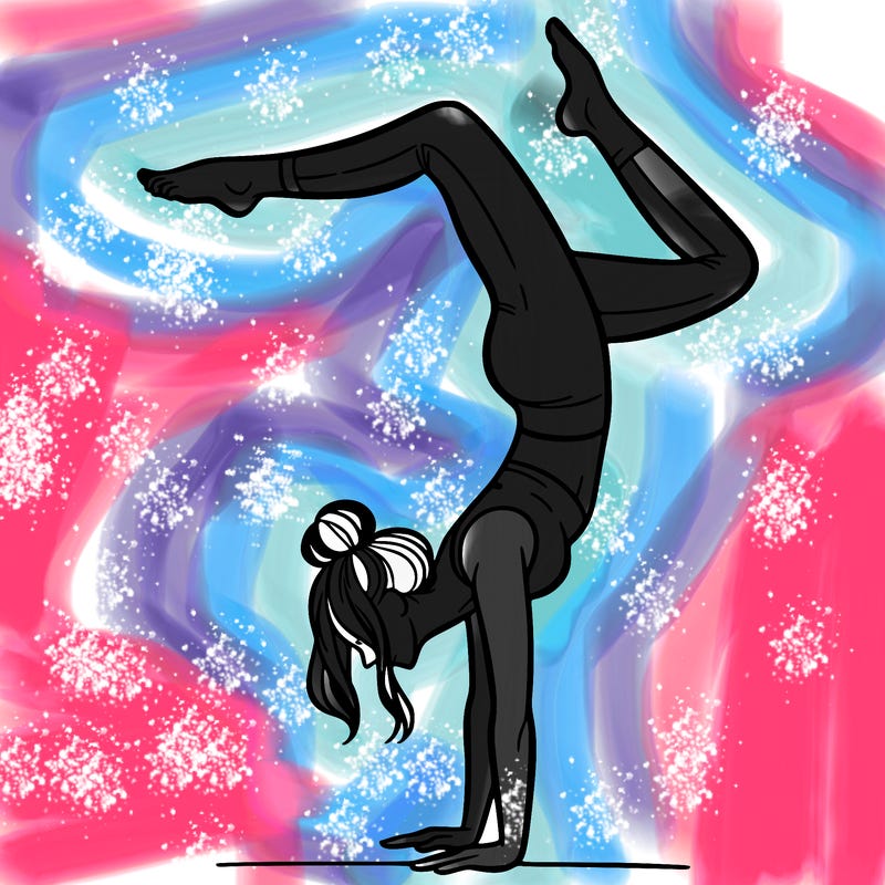 a woman doing a handstand