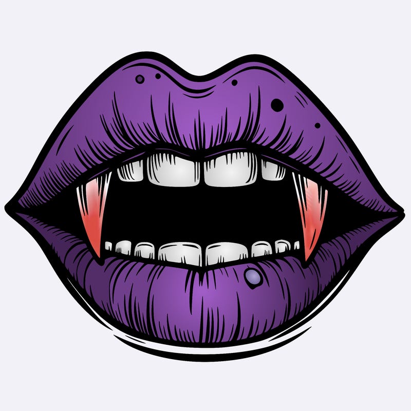 lips with vampire teeth