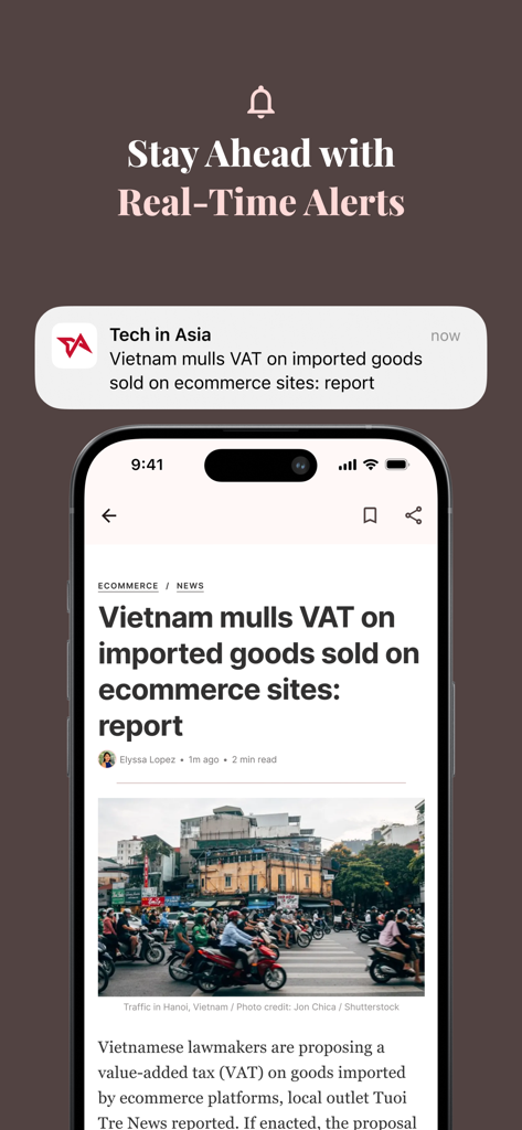 Tech in Asia: News & Analysis - A smartphone showing a Tech in Asia real-time news notification and an article about ecommerce trends in Vietnam