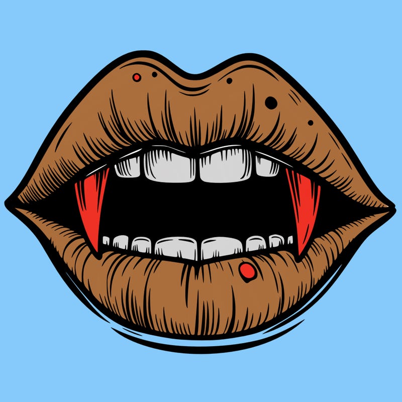 lips with vampire teeth