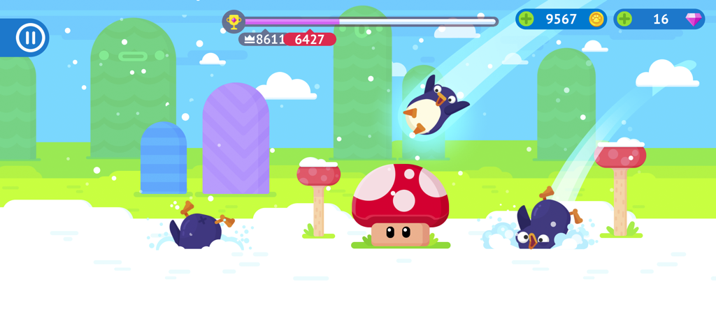 A penguin flying through a colorful level with mushrooms in the Bouncemasters arcade game