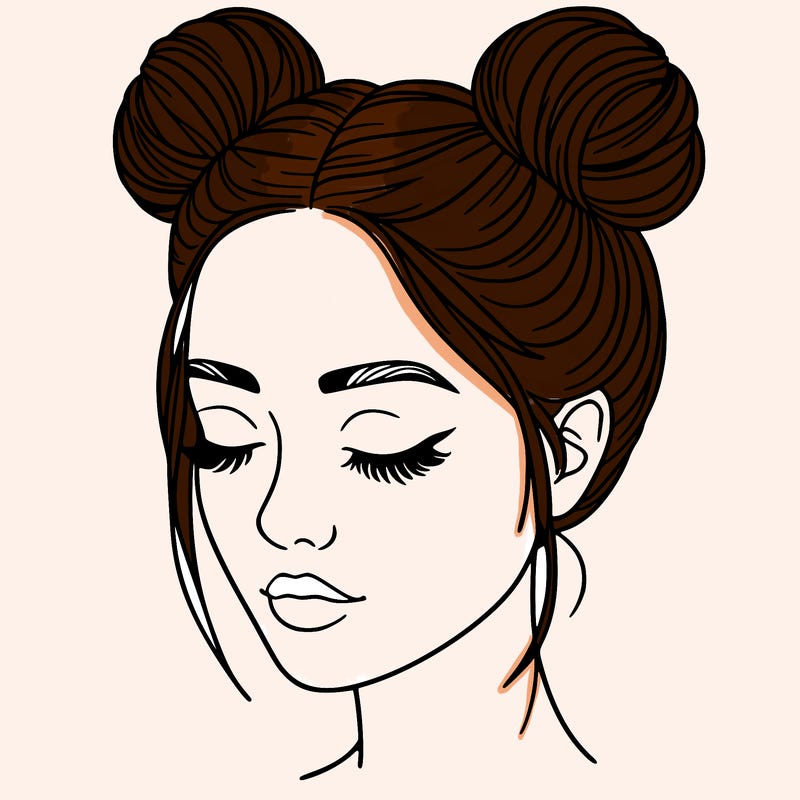 woman with hair buns