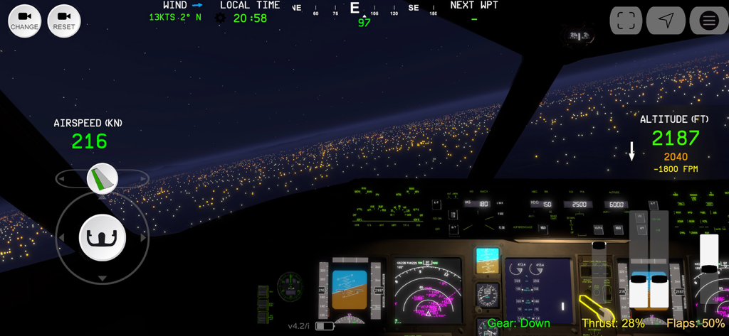Flight Simulator Advanced - Interactive cockpit view of an airplane flying at night over city lights
