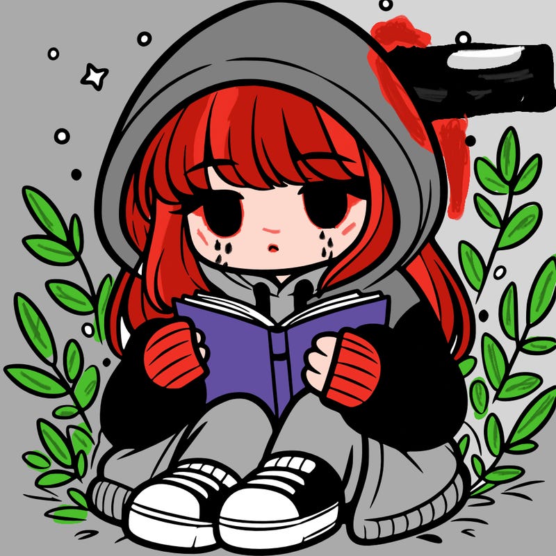 girl in oversized hoodie reading a book