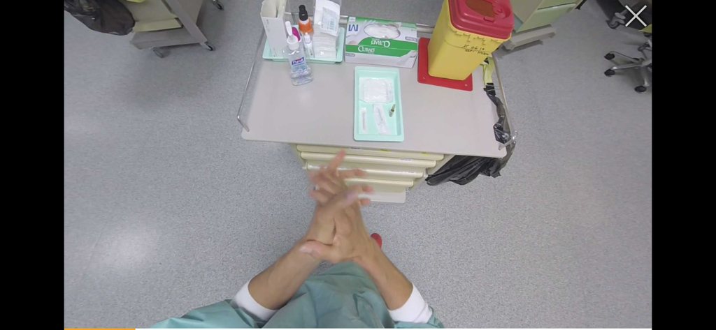 Keyros Medica (Ex Revinax) - A first person perspective of a medical professional sanitizing their hands before a procedure in a virtual reality training simulation