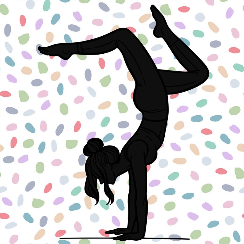 a woman doing a handstand