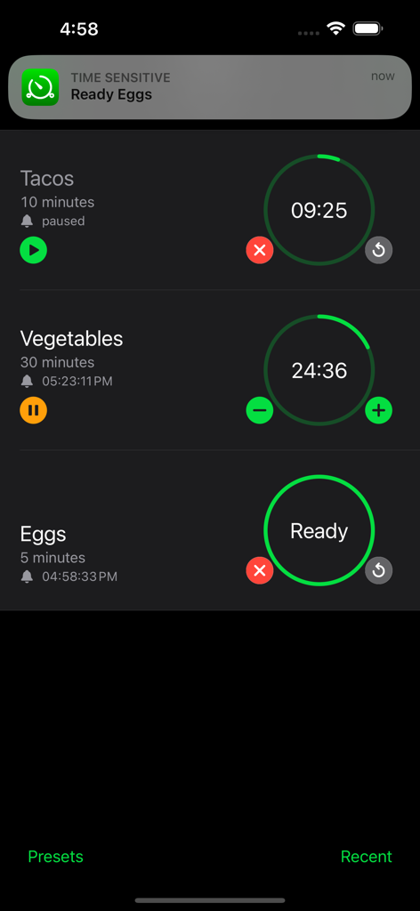iPhone interface showing multiple simultaneous kitchen timers for tacos vegetables and eggs
