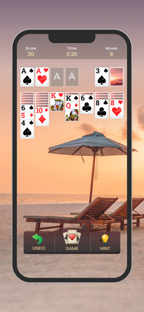 Classic Solitaire card game being played on a mobile device with a relaxing sunset beach background theme